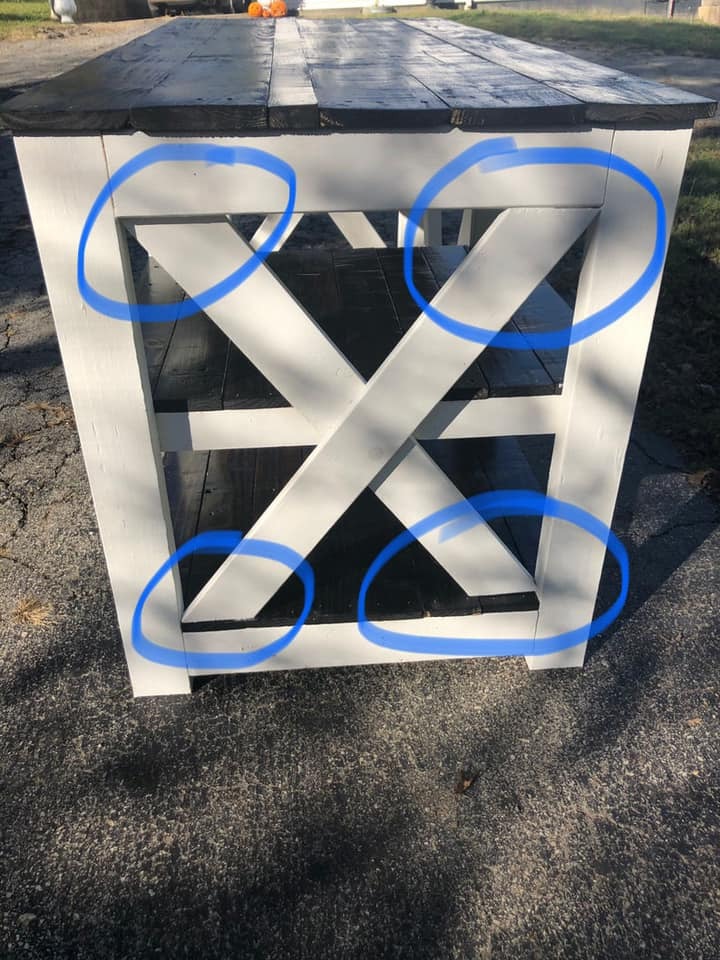 Photo of the end of a wooden table